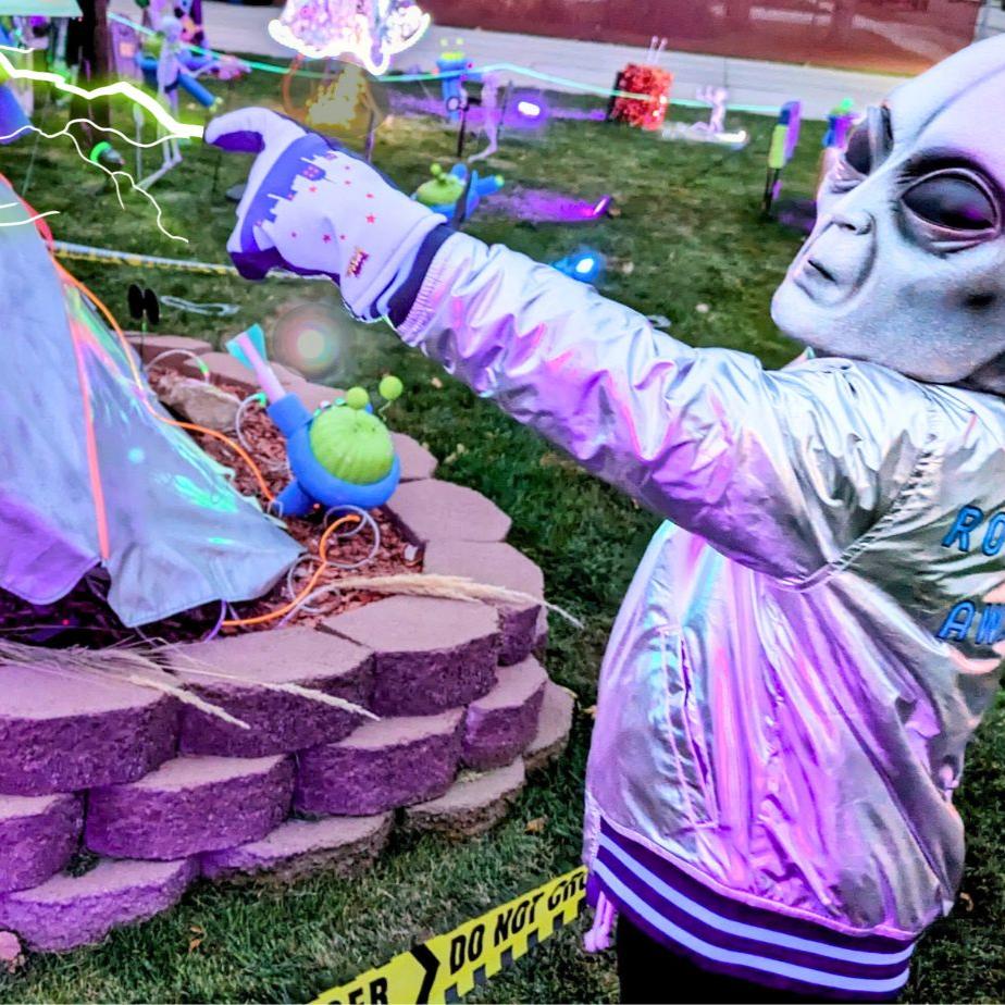 alien wearing UFO Freezy Freakies zapping another alien