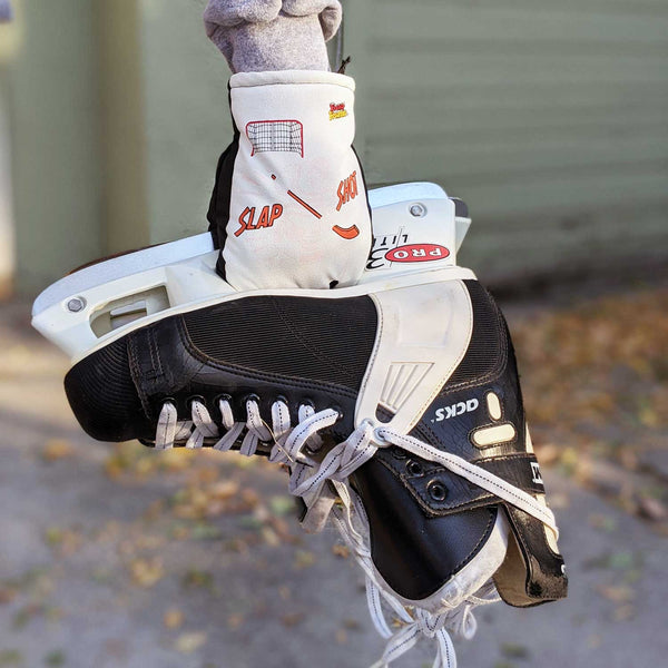 Freezy Freakies Slap Shot Hockey gloves holding the all-time greatest skates ever
